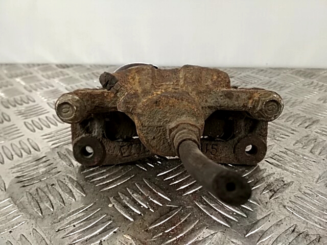 Суппорт задний левый MITSUBISHI Galant VII 1992-1998