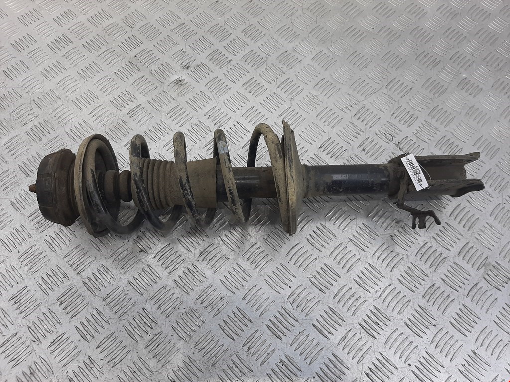 Стойка амортизатора переднего левого Renault Sandero 1 (2007-2014)