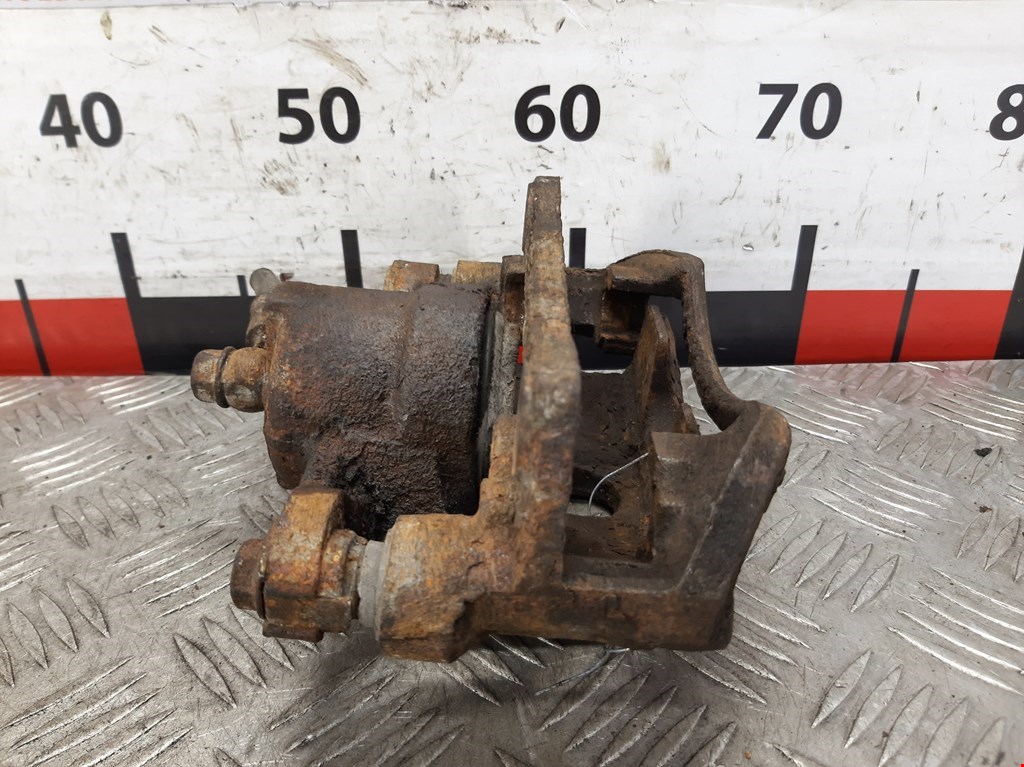 Суппорт передний правый SUZUKI Wagon R 1998-2003