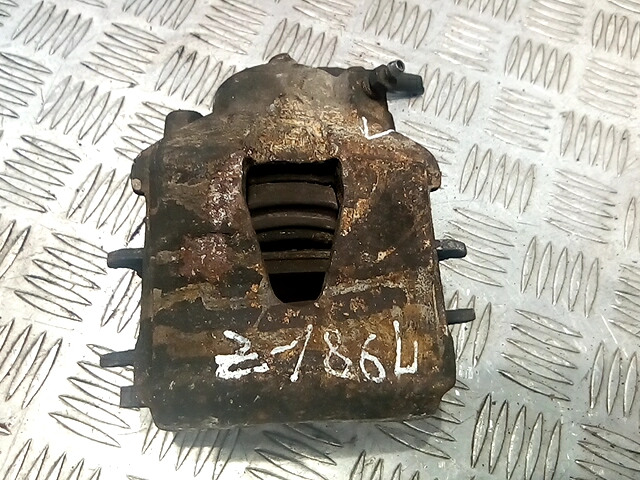 Суппорт передний левый Volkswagen Caddy 3 (2004-2015)