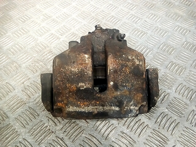 Суппорт передний левый Volkswagen Caddy 3 (2004-2015)