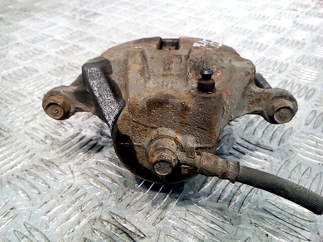 Суппорт передний правый HYUNDAI Elantra III XD 2000-2010