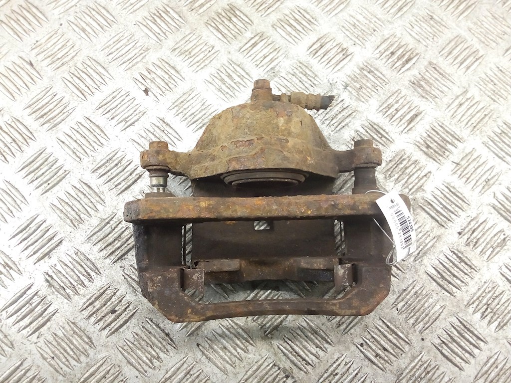 Суппорт передний левый KIA Carens 1999-2002