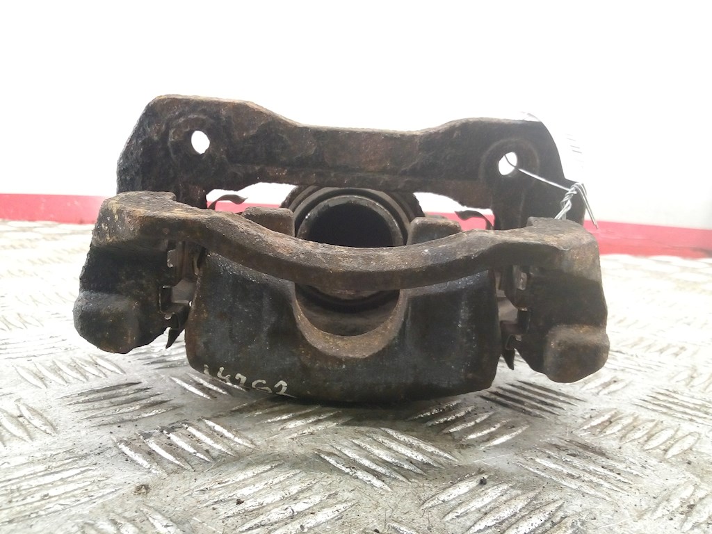 Суппорт передний левый KIA Carens 1999-2002