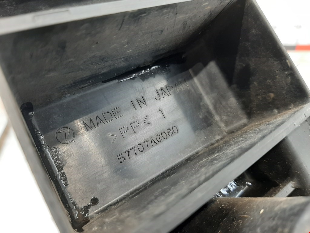 Кронштейн переднего бампера центральный SUBARU Outback 2003-2009