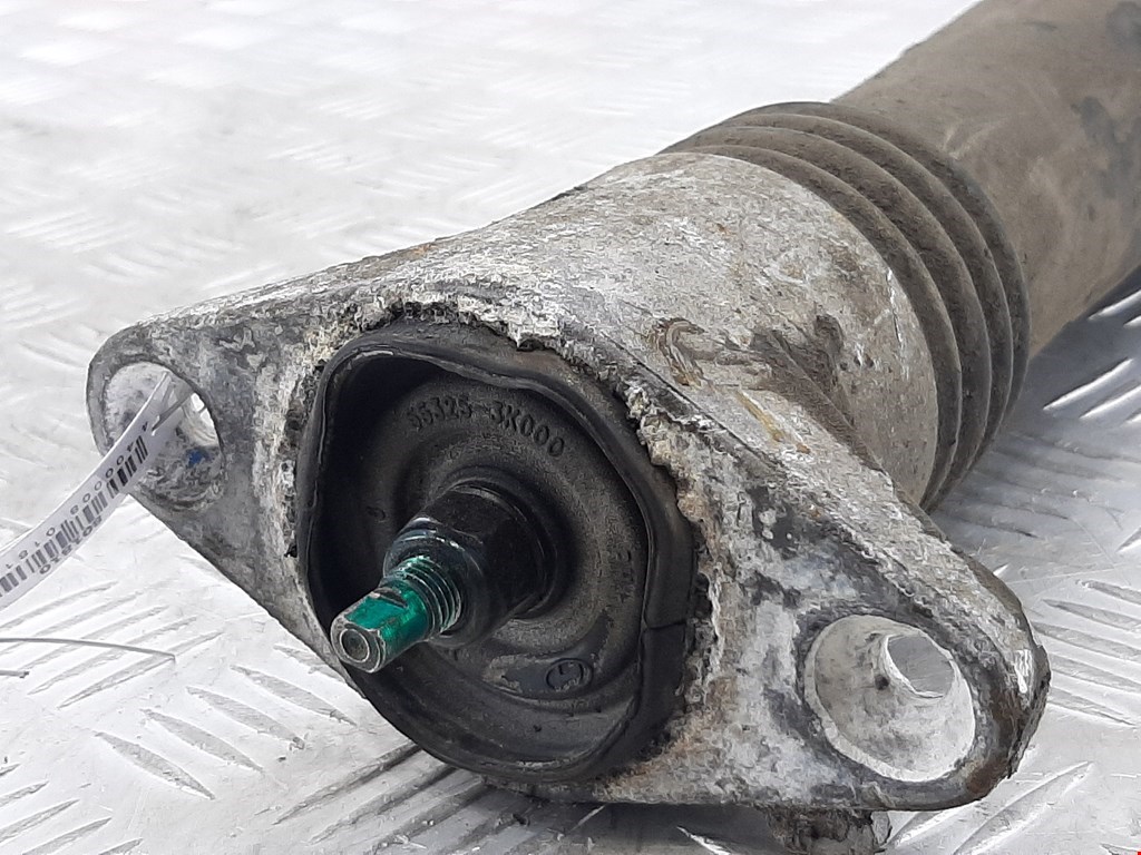 Амортизатор задний левый KIA Carens 2006-2012