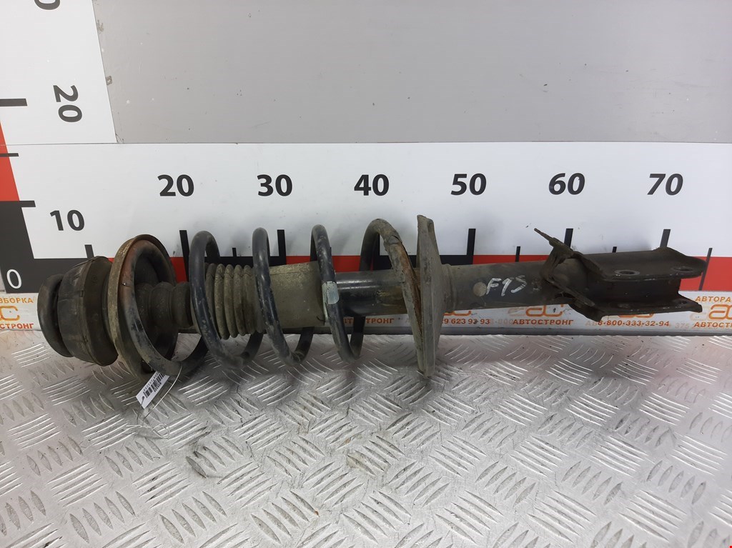 Стойка амортизатора переднего левого Renault Sandero 1 (2007-2014)