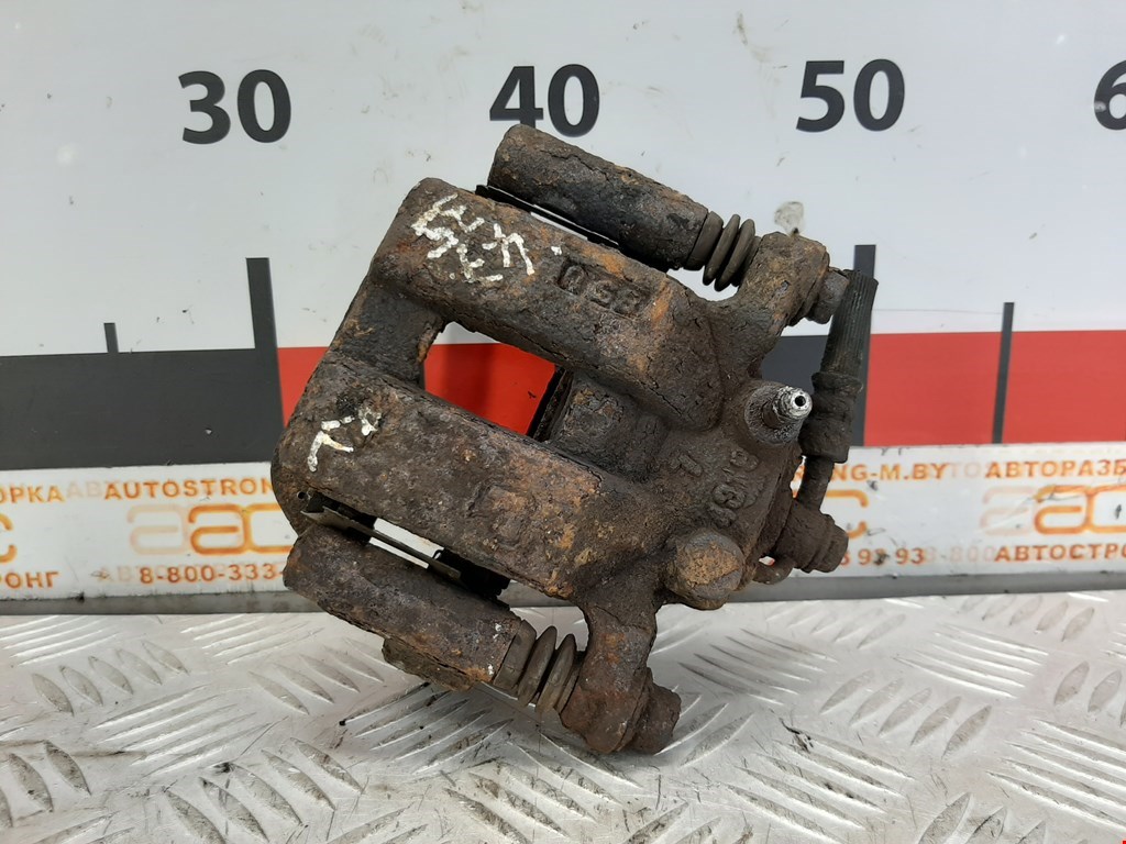 Суппорт задний левый Renault Koleos (2008-2016)