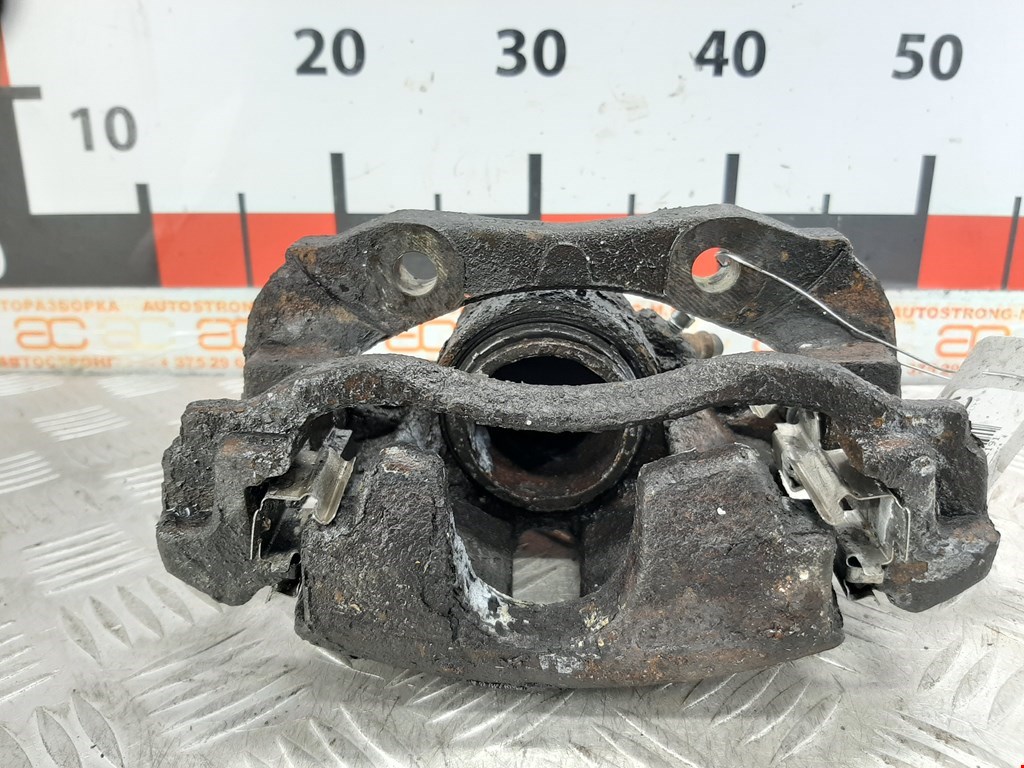 Суппорт передний правый PEUGEOT Partner 1996-2009