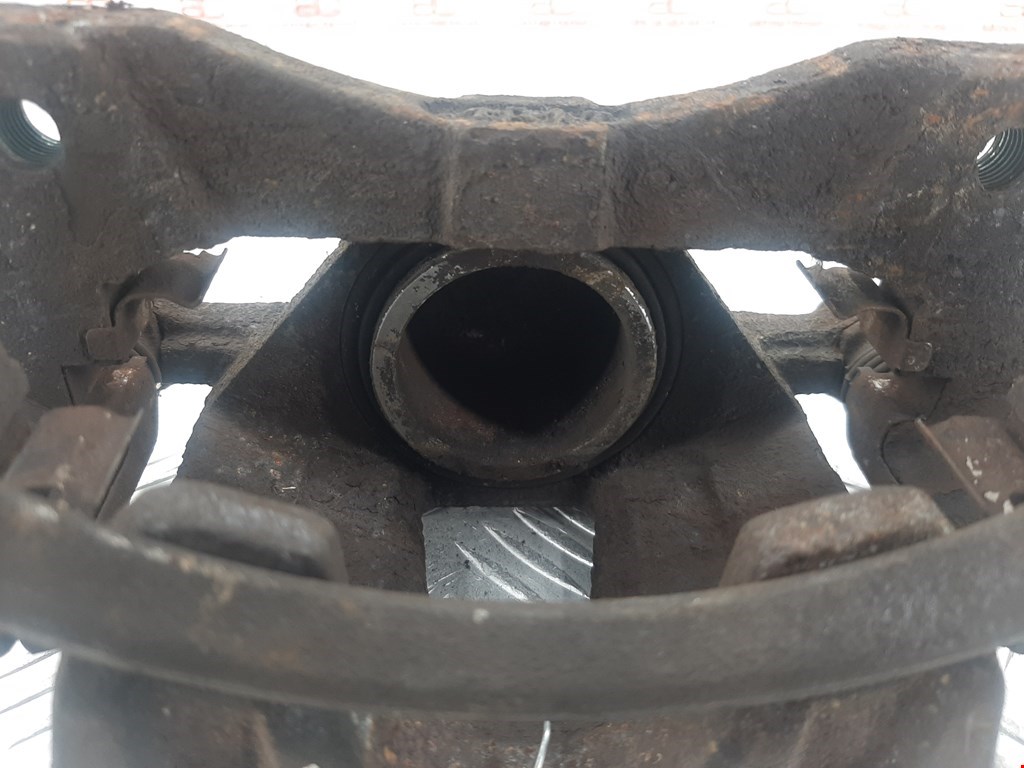 Суппорт передний левый DAEWOO Nubira 2003-2007