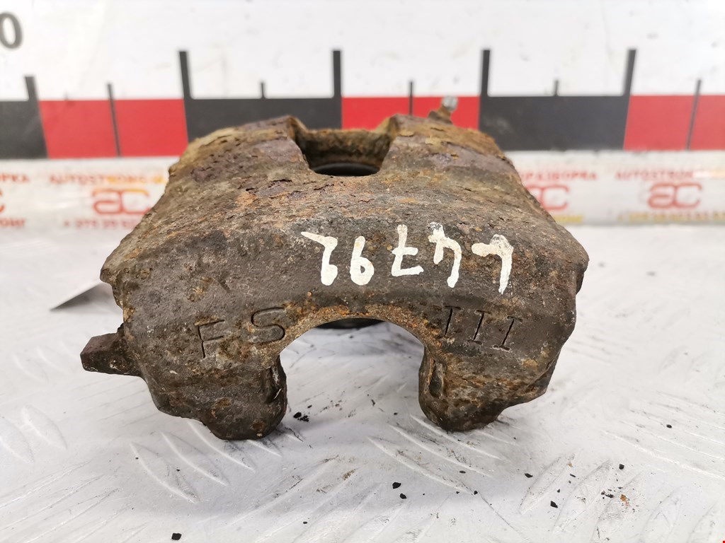 Суппорт передний левый Volkswagen Caddy 3 (2004-2015)