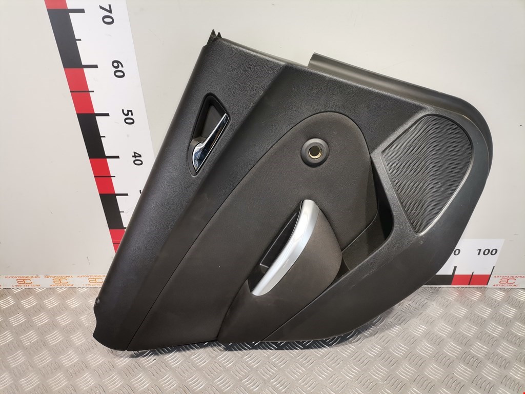 Обшивка двери задняя левая OPEL Astra J 2009-2017