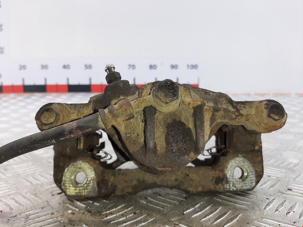 Суппорт передний левый HONDA Logo 1996-2001