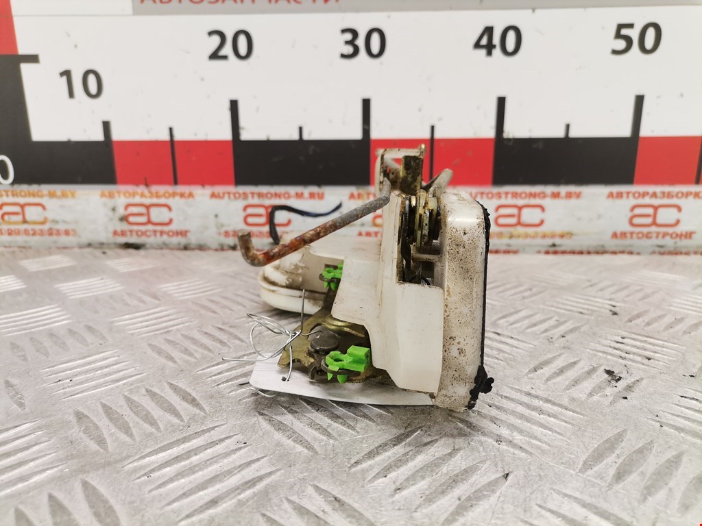 Замок двери передней правой MITSUBISHI L200 K6,K7 1996-2006