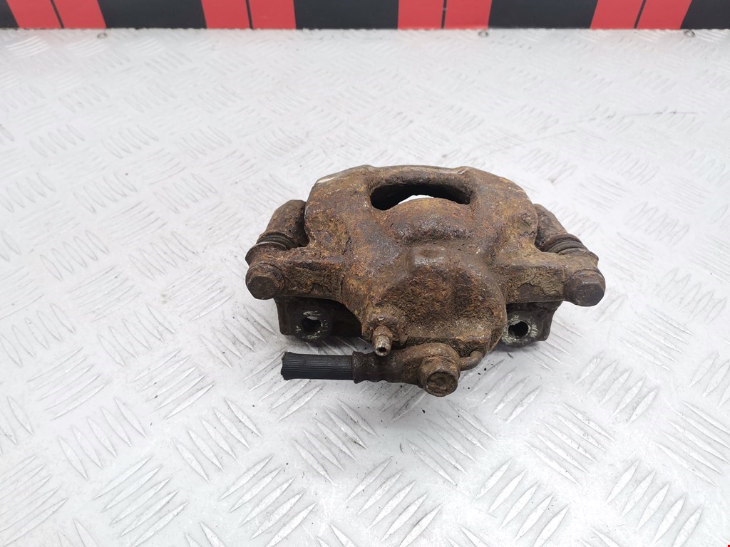 Суппорт передний левый TOYOTA Aygo AB10 2005-2014