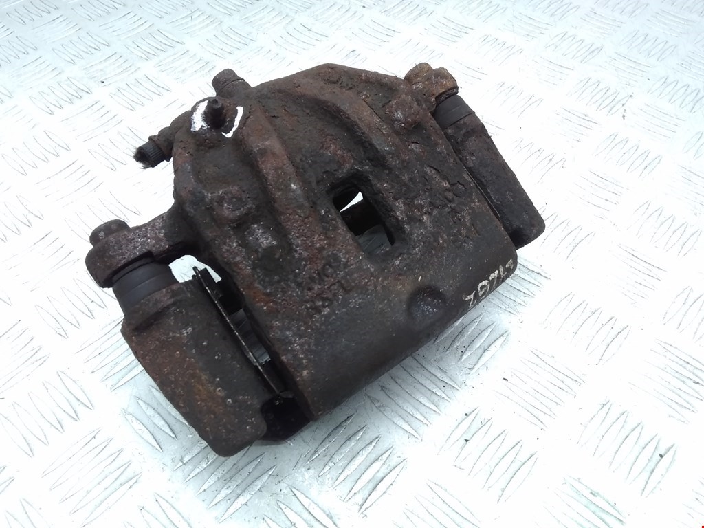 Суппорт передний левый KIA Carens 1999-2002