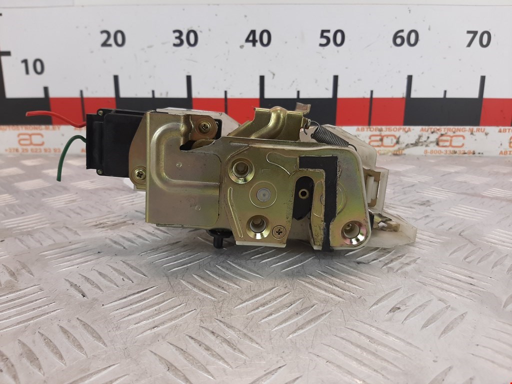 Замок двери задней левой MAZDA 323 BA 1994-1998