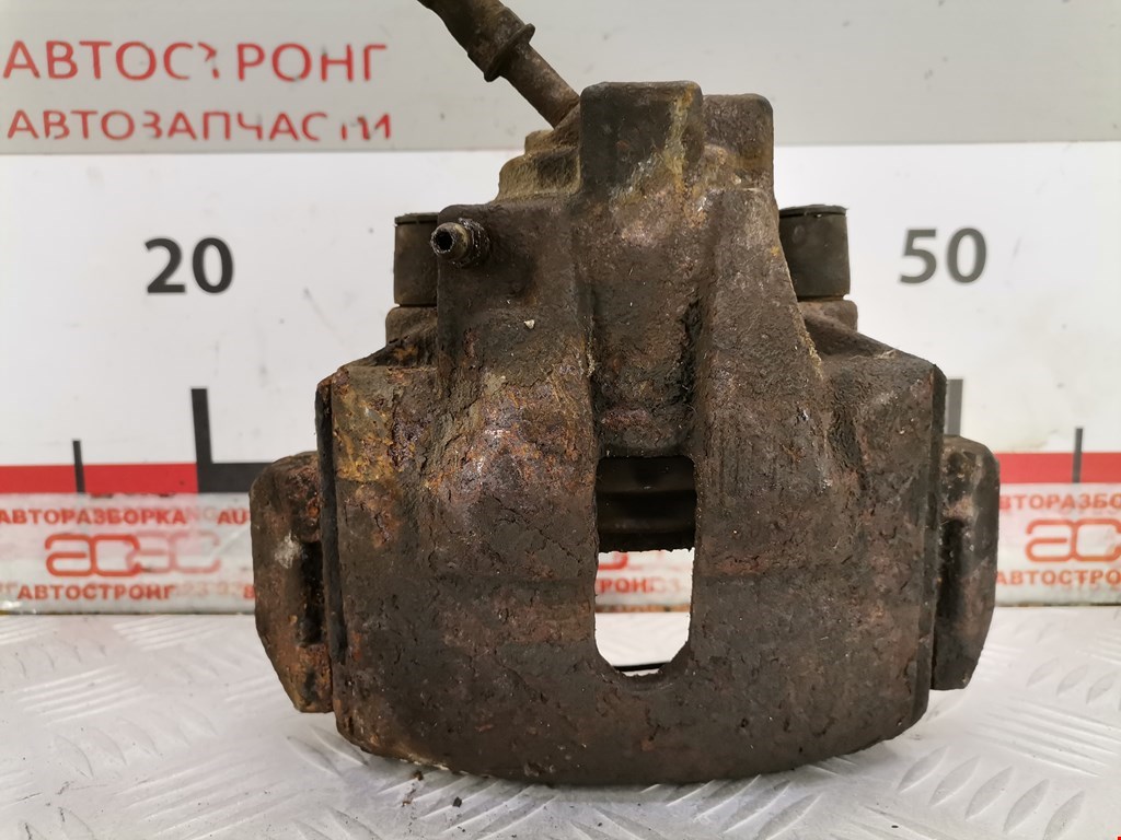 Суппорт передний правый FORD Cougar 1998-2002