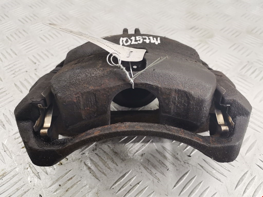 Суппорт передний левый NISSAN NV200 2009-н.в.