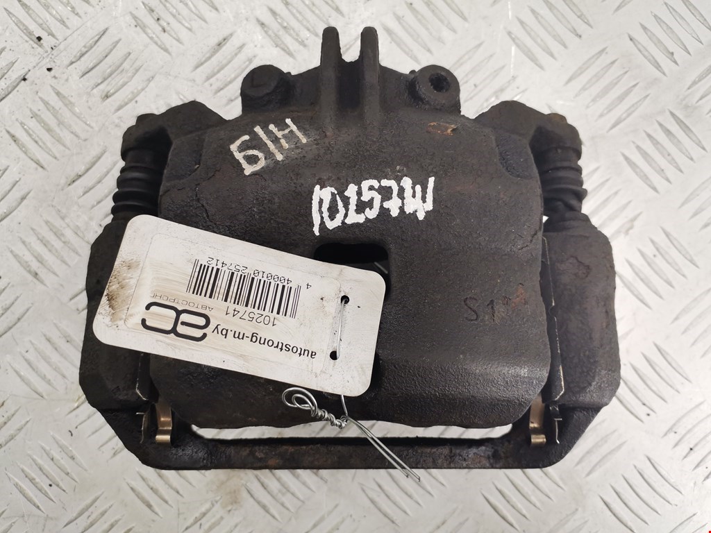 Суппорт передний левый NISSAN NV200 2009-н.в.