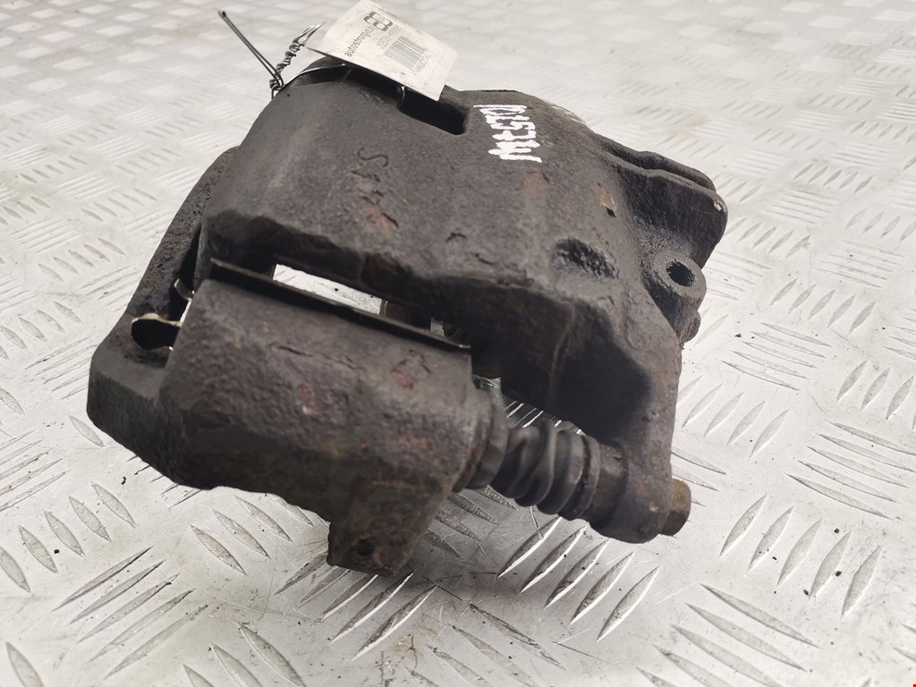 Суппорт передний левый NISSAN NV200 2009-н.в.