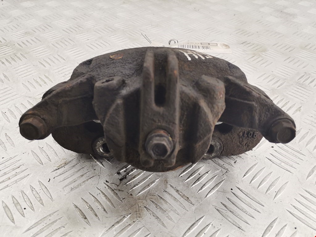 Суппорт передний левый NISSAN NV200 2009-н.в.