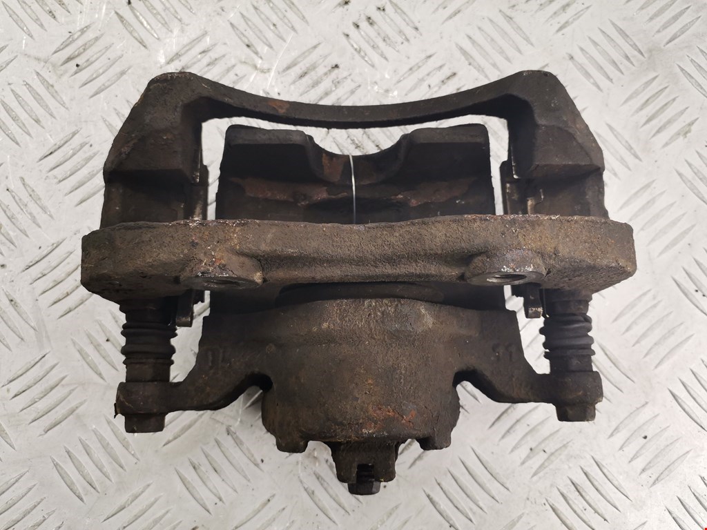 Суппорт передний левый NISSAN NV200 2009-н.в.