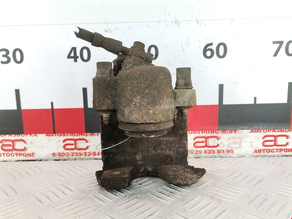 Суппорт передний левый VOLKSWAGEN Polo III 1994-2001