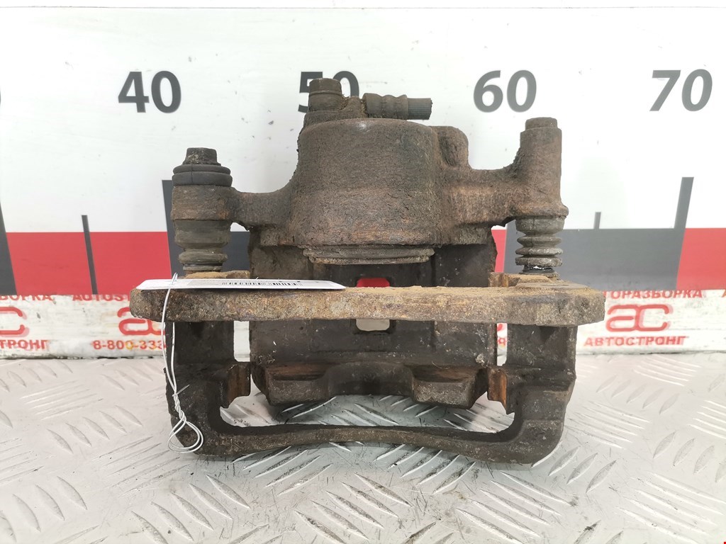 Суппорт передний левый SUBARU Legacy 1994-1999