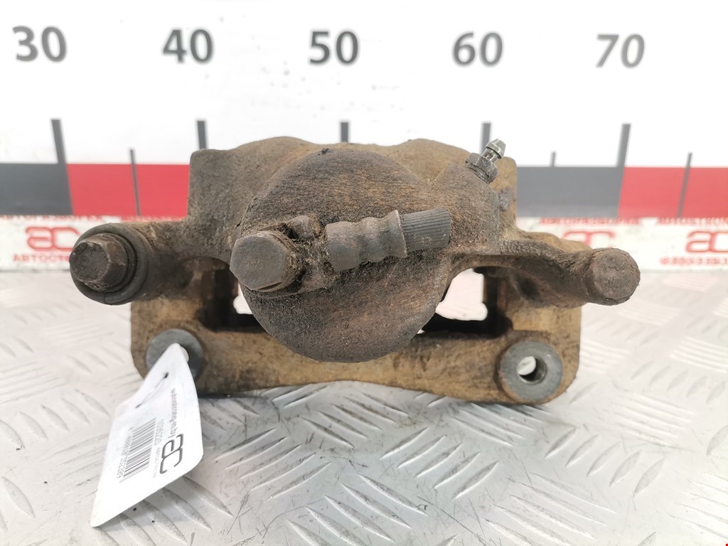 Суппорт передний левый SUBARU Legacy 1994-1999