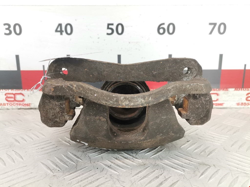 Суппорт передний левый SUBARU Legacy 1994-1999