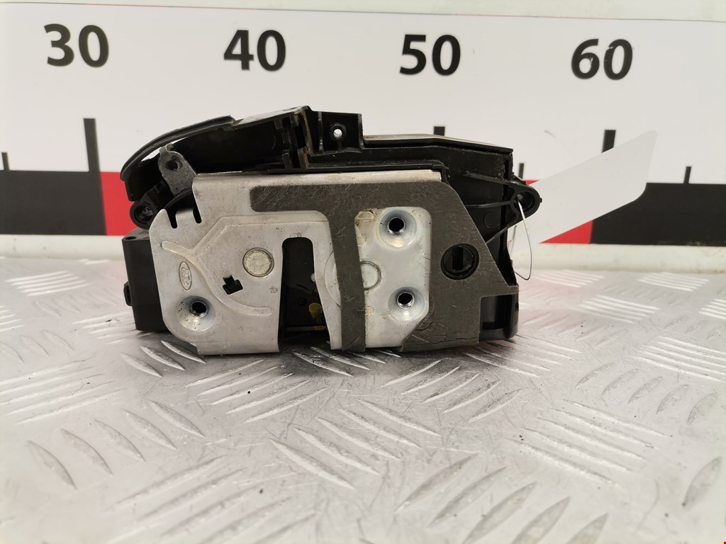 Замок двери передней левой FORD Fiesta 2008-2012