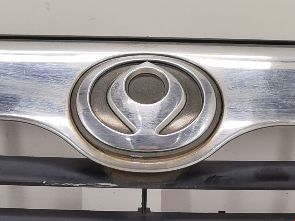 Решетка радиатора MAZDA 121 1987-1991