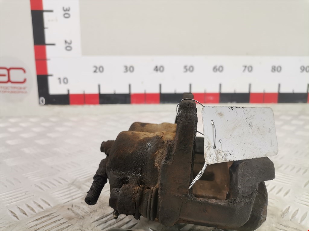 Суппорт передний левый SUBARU Impreza 2000-2007