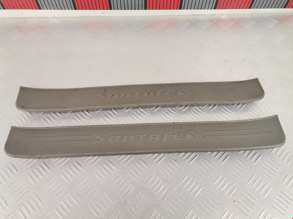 Накладка декоративная на порог левая Hyundai Santa Fe 2 (CM) (2005-2012)