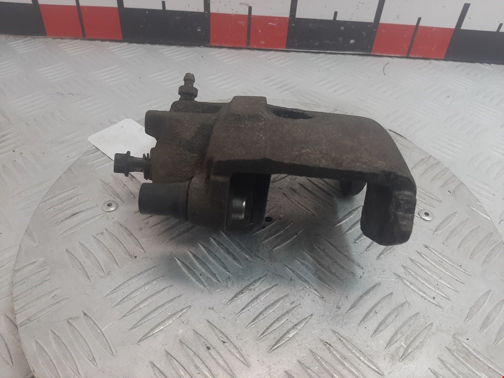 Суппорт передний левый VOLKSWAGEN Polo III 1994-2001