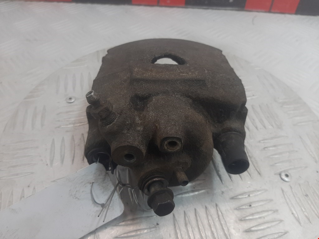 Суппорт передний левый VOLKSWAGEN Polo III 1994-2001