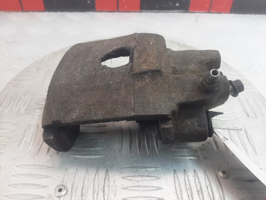 Суппорт передний левый VOLKSWAGEN Polo III 1994-2001