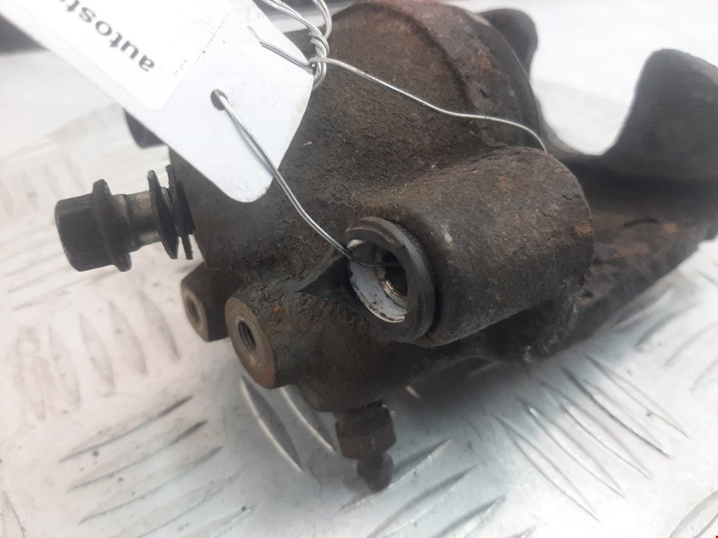 Суппорт передний левый VOLKSWAGEN Polo III 1994-2001