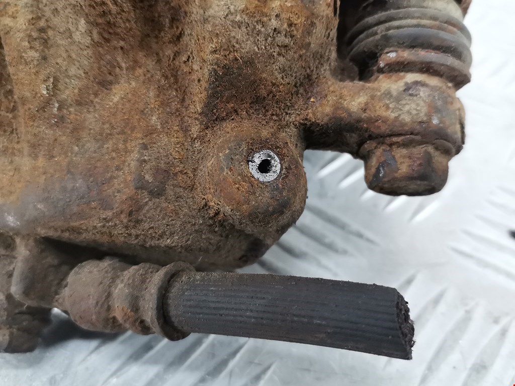 Суппорт задний левый SUBARU Impreza 2000-2007