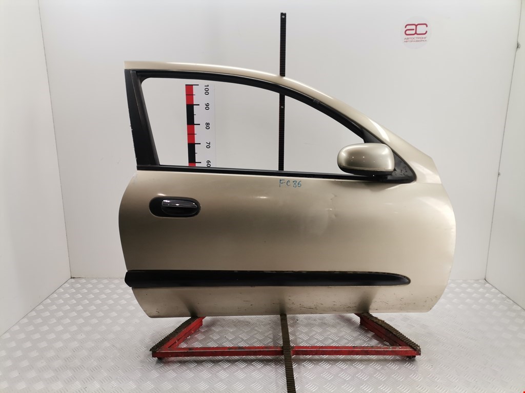 Обшивка (карта) двери передней правой Nissan Almera N16 (2000-2006)