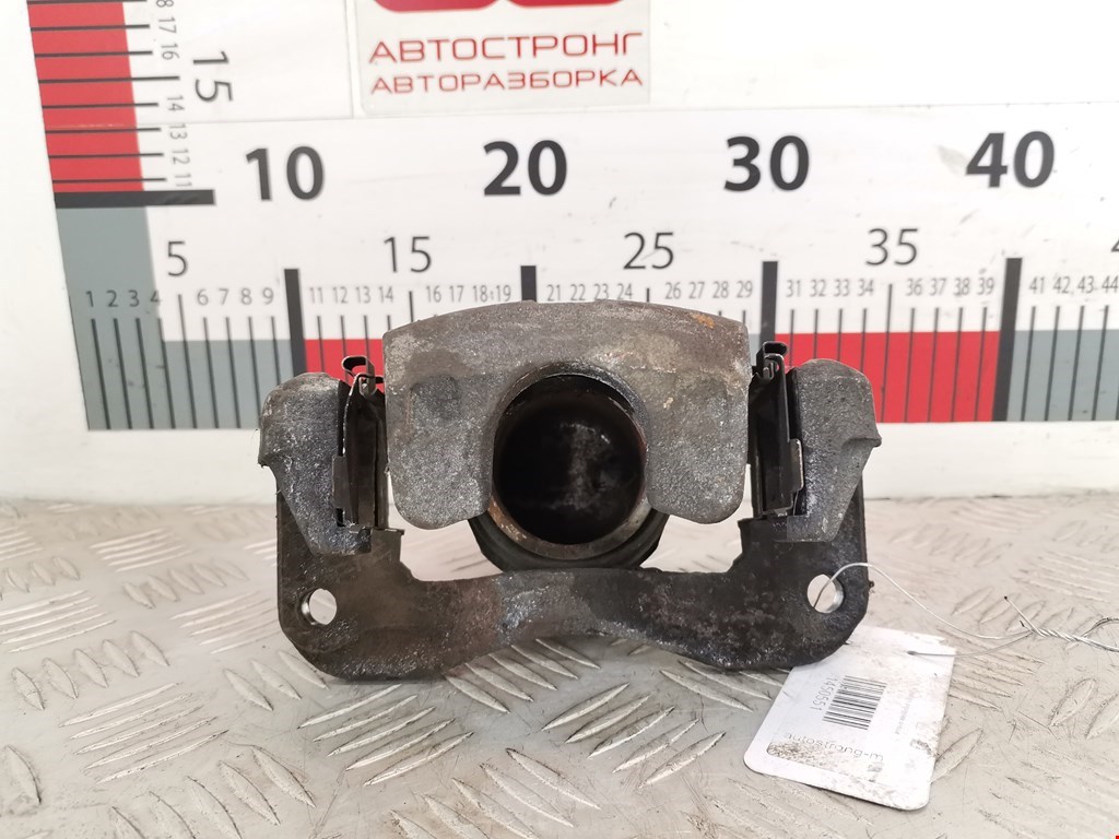 Суппорт передний левый SUZUKI Baleno 1995-2002