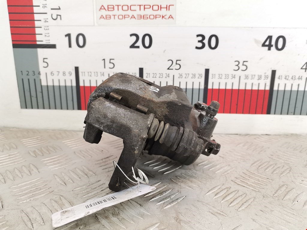 Суппорт передний левый SUZUKI Baleno 1995-2002