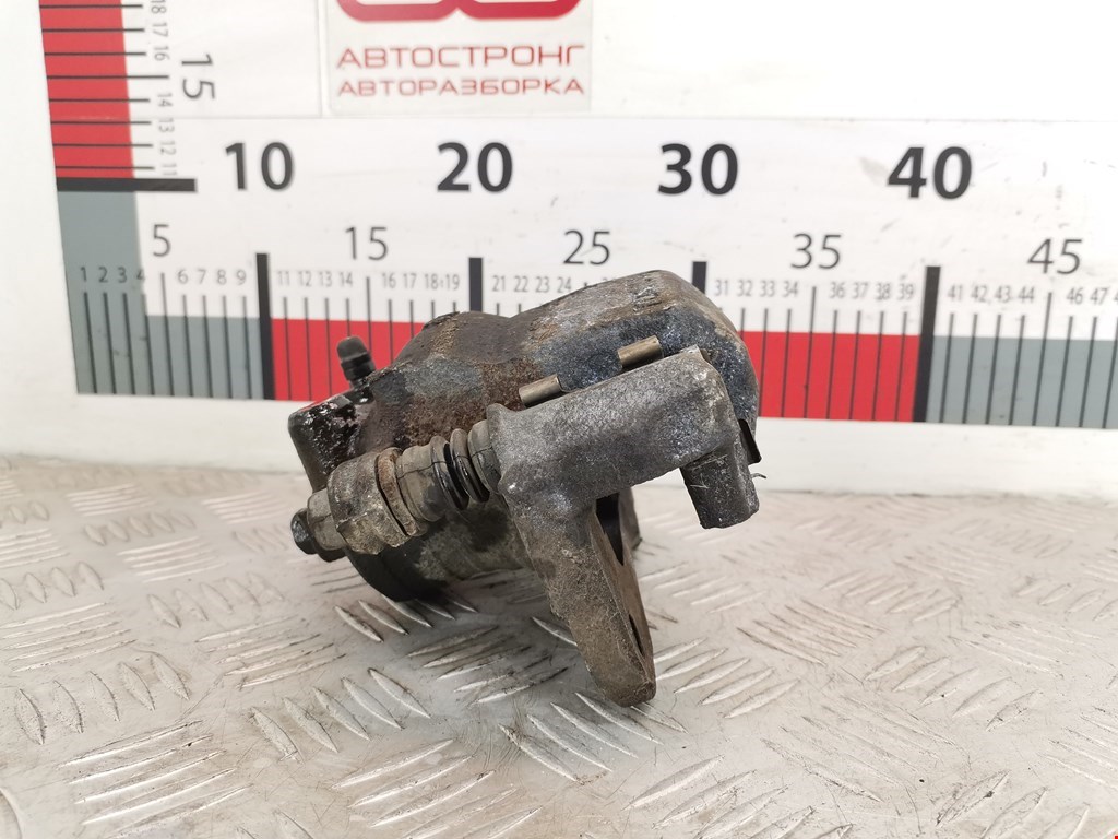 Суппорт передний левый SUZUKI Baleno 1995-2002