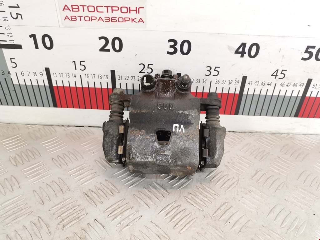 Суппорт передний левый SUZUKI Baleno 1995-2002