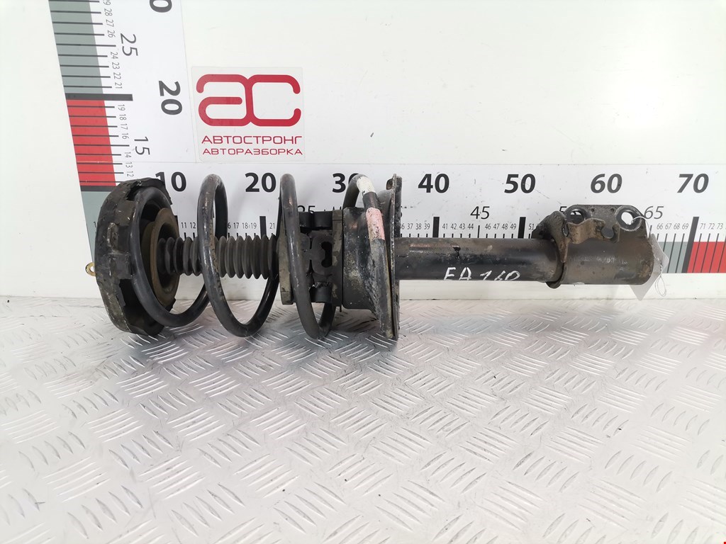 Стойка амортизатора переднего левого Renault Scenic 1 (1996-2003)