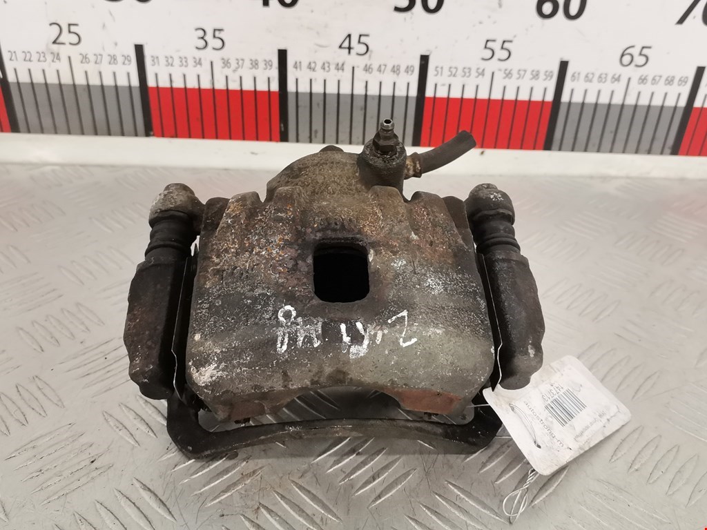 Суппорт передний левый SUZUKI Swift 1989-2003