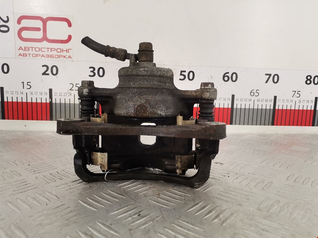 Суппорт передний левый SUZUKI Swift 1989-2003