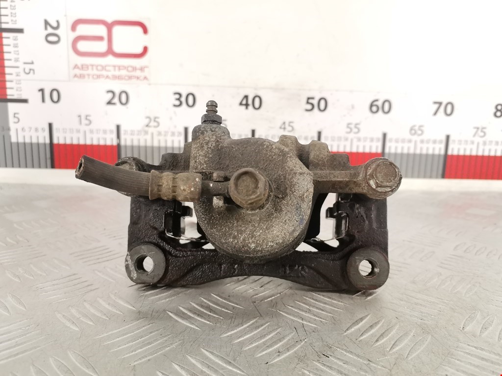 Суппорт передний левый SUZUKI Swift 1989-2003