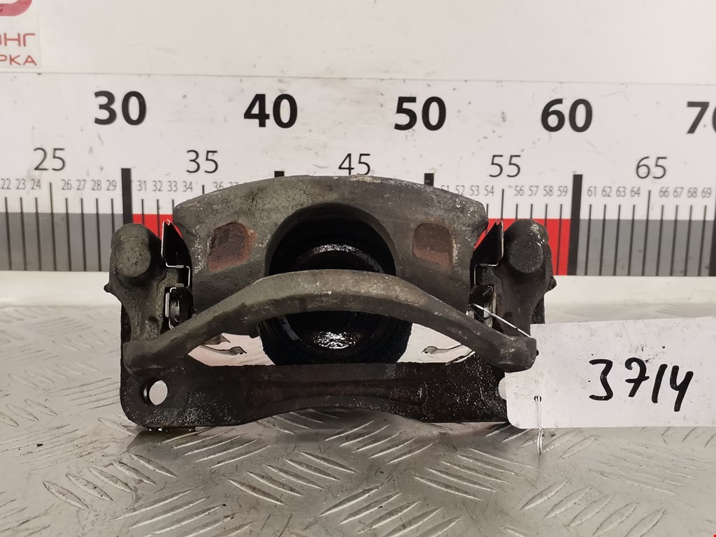 Суппорт передний правый SUZUKI Swift 1989-2003